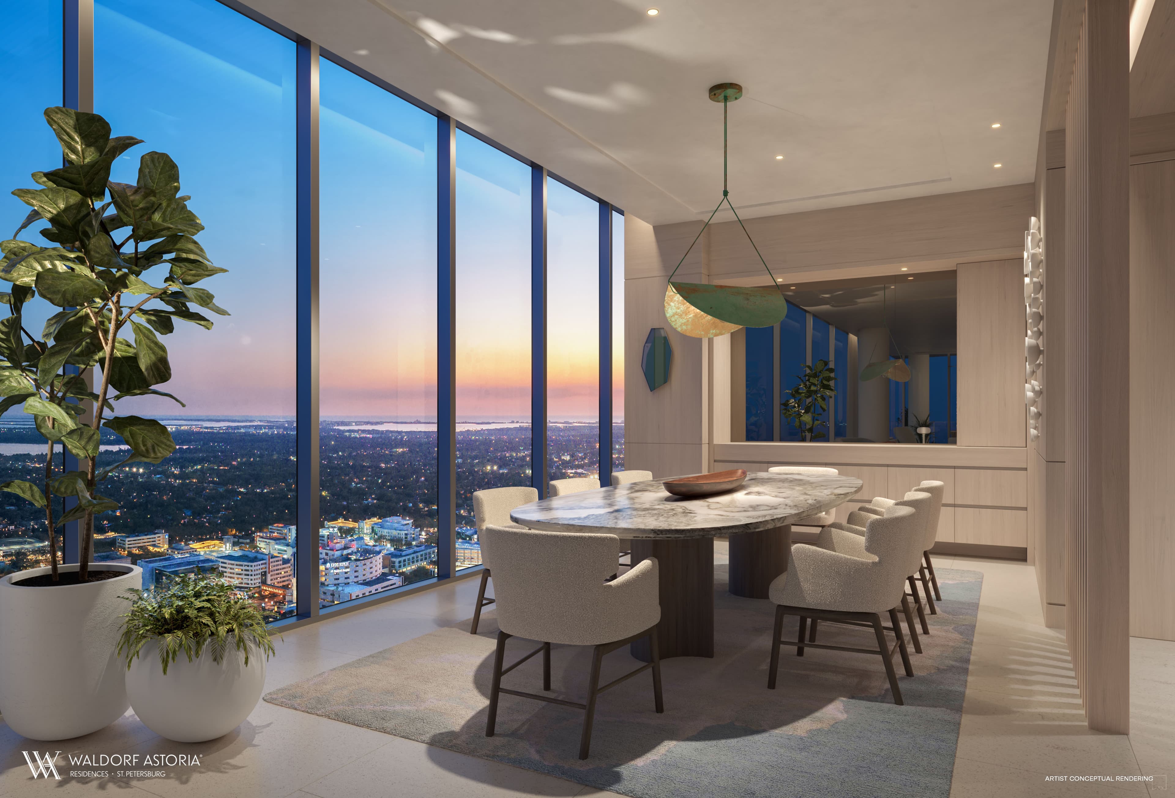 Formal dining space with waterfront backdrop